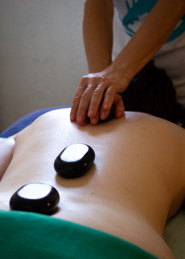 Therapist giving cupping treatment no customer's back